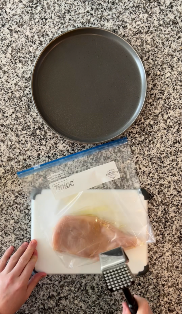 Flattening out chicken breast before grilling